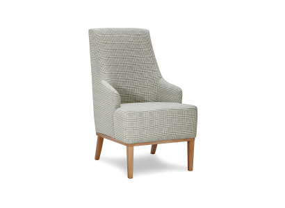 Designstol i tyg och läder för en person i TV-rummet