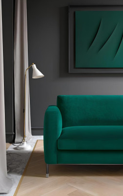 Grön tygsoffa för två personer