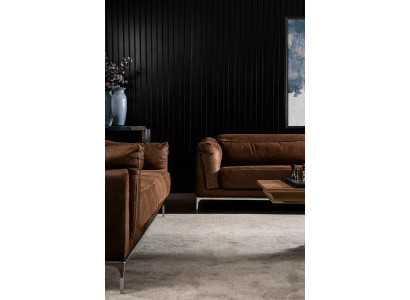 Mjuk soffa för 3 personer i brun sammet