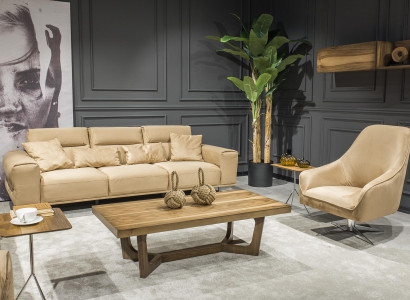 Beige bänk för tre personer med kuddar