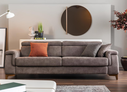 Grå soffa med tre platser och sängfunktion