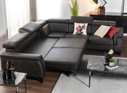 Mustasta lädersoffa med sängfunktion