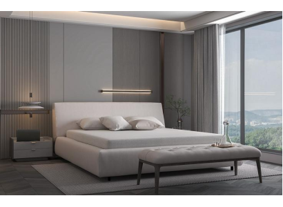 Elegant säng med kuddar