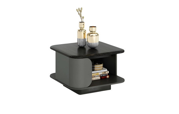 Modern kaffebord med kompakta mått och en ljus topp, svart yta