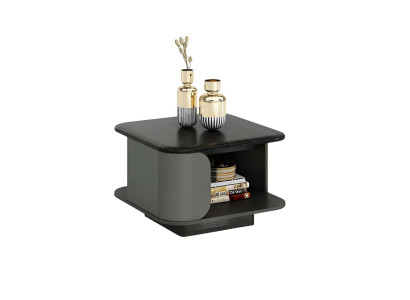 Modern kaffebord med kompakta mått och en ljus topp, svart yta