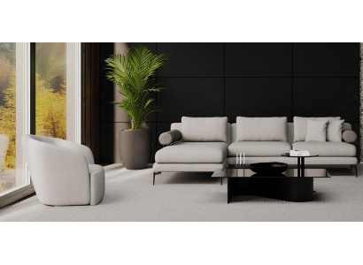 Hörnsoffa med fåtölj, där komforten är närvarande