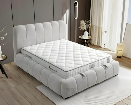 Säng i modern vit tyg med kvalitetsmadrass