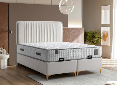 Eleganta säng i tyg och trä