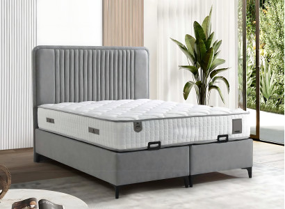 Säng elegant i tyg och trä med madrass