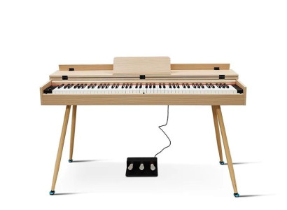 Digital piano i beige för hemmet