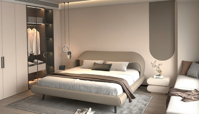 Säng med elegant design och rundade former