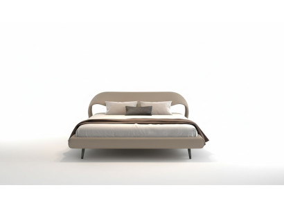 Säng med elegant design och rundade former