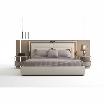Pat modern lyx i beige med bruna accenter och en elegant huvudgavel